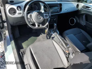2015 Volkswagen Beetle 1.8T with VIN 3VW517AT8FM810709, listed as a Copart auction lot 48065314 with 61,924 mi miles and Salvage Title. Bid and sale history available at DreamBid. Image 8.