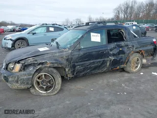2003 Subaru Baja with VIN 4S4BT61C536100698, listed as a IAAI auction lot 41613071 with 221,393 mi miles. Bid and sale history available at carsss.com. Image 6.