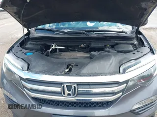 2016 Honda Pilot EX-L with VIN 5FNYF6H51GB097337, listed as a IAAI auction lot 42173415 with 145,415 mi miles. Bid and sale history available at carsss.com. Image 10.