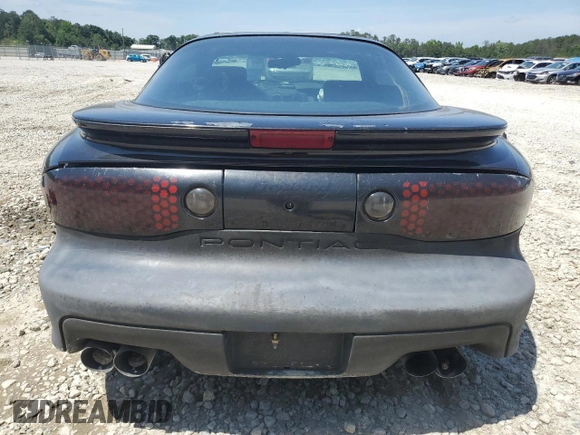 1999 Pontiac Firebird Formula with VIN 2G2FV22G4X2233748, listed as a Copart auction lot 55693535 with 166,622 mi miles and Salvage title. Bid and sale history available at DreamBid. Image 6.