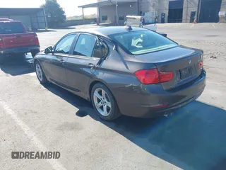 2014 BMW 3 Series 328i with VIN WBA3C1C57EK116483, listed as a IAAI auction lot 42697759 with 113,010 mi miles and . Bid and sale history available at DreamBid. Image 3.