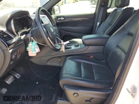 2020 Jeep Grand Cherokee High Altitude with VIN 1C4RJFCG2LC211526, listed as a Copart auction lot 54593905 with 75,396 mi miles and Salvage title. Bid and sale history available at DreamBid. Image 7.