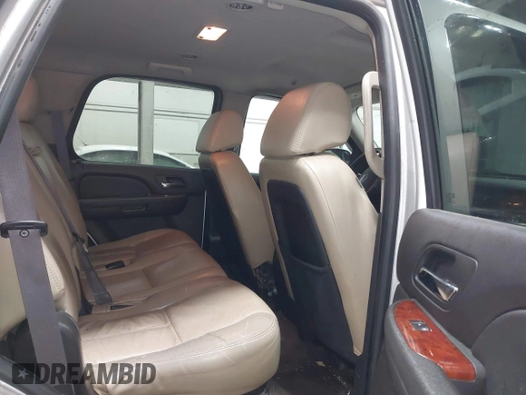 2011 GMC Yukon SLE with VIN 1GKS2AE01BR233860, listed as a IAAI auction lot 41838392 with 226,611 mi miles. Bid and sale history available at carsss.com. Image 8.