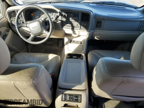 2001 GMC Yukon SLT z VIN 1GKEC13T41J148550, wystawiony jako Copart lot #80580964 z przebiegiem Nie podano mil oraz Szkoda całkowita • Salvage title. Historia ofert i sprzedaży dostępna na DreamBid. Obrazek 8.