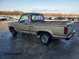 1989 Ford Ranger XL with VIN 1FTCR10AXKUC35082, listed as a Copart auction lot 42209825 with 754,095 mi miles and Salvage title. Bid and sale history available at DreamBid. Image 2.