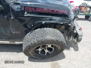 2022 Jeep Wrangler Unlimited Rubicon with VIN 1C4HJXFN2NW134024, listed as a IAAI auction lot 42248188 with 41,899 mi miles and . Bid and sale history available at DreamBid. Image 6.