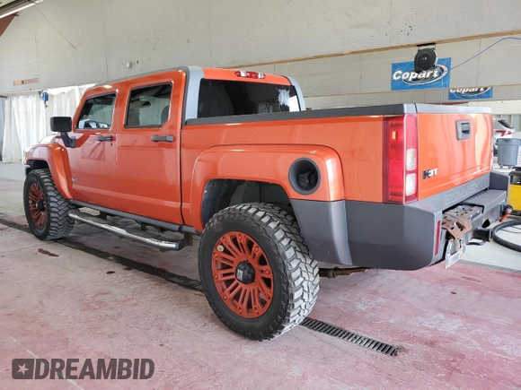 2009 Hummer H3 with VIN 5GNEN13E998144228, listed as a Copart auction lot 70231814 with 119,203 mi miles and Clean Title. Bid and sale history available at DreamBid. Image 2.