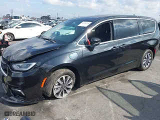 2023 Chrysler Pacifica Hybrid Touring L with VIN 2C4RC1L78PR543402, listed as a IAAI auction lot 41536710 with 35,867 mi miles. Bid and sale history available at carsss.com. Image 19.