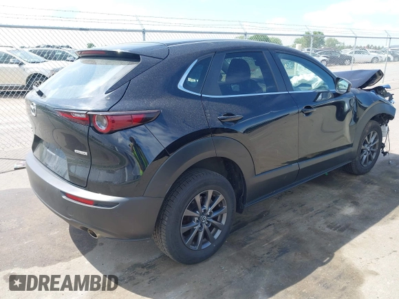 2021 Mazda CX-30 S with VIN 3MVDMBAL0MM254030, listed as a IAAI auction lot 42261180 with 72,459 mi miles and . Bid and sale history available at DreamBid. Image 4.