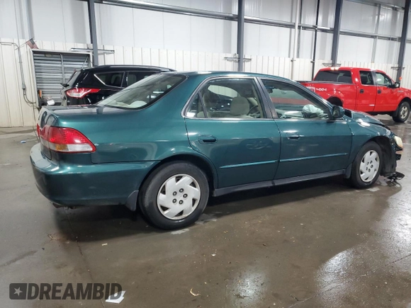 2002 Honda Accord LX z VIN 1HGCG16442A043585, wystawiony jako Copart lot #74481474 z przebiegiem 223 446 mil mil oraz Szkoda całkowita • Salvage title. Historia ofert i sprzedaży dostępna na DreamBid. Obrazek 3.