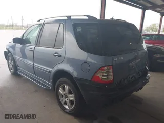 2005 Mercedes-Benz M-Class 3.7L with VIN 4JGAB57E25A560516, listed as a IAAI auction lot 41898369 with 125,927 mi miles. Bid and sale history available at carsss.com. Image 3.