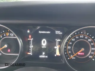 2021 Jeep Gladiator Overland z VIN 1C6HJTFGXML555622, wystawiony jako IAAI lot #42237686 z przebiegiem 62 358 mil mil oraz . Historia ofert i sprzedaży dostępna na DreamBid. Obrazek 7.