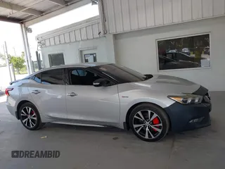 2018 Nissan Maxima SL with VIN 1N4AA6AP2JC385180, listed as a IAAI auction lot 42340264 with 115,736 mi miles and . Bid and sale history available at DreamBid. Image 13.