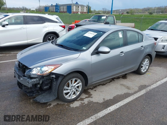 2012 Mazda 3 i Touring with VIN JM1BL1V71C1677133, listed as a IAAI auction lot 41991234 with 104,610 mi miles and . Bid and sale history available at DreamBid. Image 2.