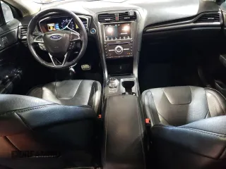 2018 Ford Fusion Titanium с VIN 3FA6P0D9XJR241506, выставлен на аукционе Copart как лот 60736525 с пробегом 109 548 миль миль и Списание • Salvage title. История ставок и продаж доступна на DreamBid. Изображение 8.