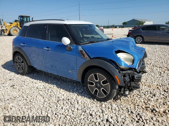 2011 MINI Countryman S with VIN WMWZC5C54BWL53955, listed as a Copart auction lot 52187405 with 124,470 mi miles and Salvage Title. Bid and sale history available at DreamBid. Image 4.