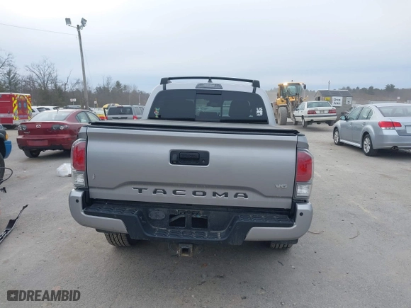 2020 Toyota Tacoma 4WD SR5 with VIN 3TMCZ5AN6LM306311, listed as a IAAI auction lot 41220025 with 67,806 mi miles. Bid and sale history available at carsss.com. Image 17.