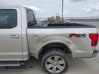 2018 Ford F-150 XL with VIN 1FTEW1E57JKC06727, listed as a IAAI auction lot 41683692 with 125,556 mi miles and . Bid and sale history available at DreamBid. Image 6.