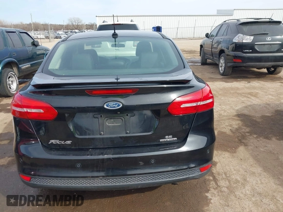 2015 Ford Focus SE with VIN 1FADP3F26FL356554, listed as a IAAI auction lot 41773139 with 143,911 mi miles. Bid and sale history available at carsss.com. Image 16.