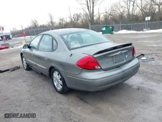 2003 Ford Taurus SEL with VIN 1FAFP56S13A124987, listed as a IAAI auction lot 41626121 with 197,237 mi miles. Bid and sale history available at carsss.com. Image 3.