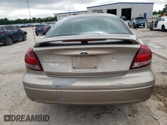 2005 Ford Taurus SE with VIN 1FAFP53205A252967, listed as a Copart auction lot 58449495 with Not provided miles and Salvage title. Bid and sale history available at DreamBid. Image 6.