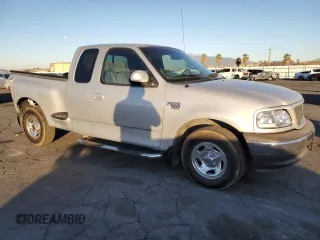 2001 Ford F-150 XL with VIN 2FTRX07L51CA91232, listed as a Copart auction lot 88556635 with 268,582 mi miles and Salvage Title. Bid and sale history available at carsss.com. Image 4.