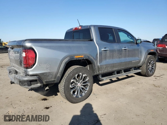 2023 GMC Canyon 4WD Denali with VIN 1GTP6FEK3P1262139, listed as a Copart auction lot 42386625 with 7,442 mi miles and Salvage Title. Bid and sale history available at carsss.com. Image 3.