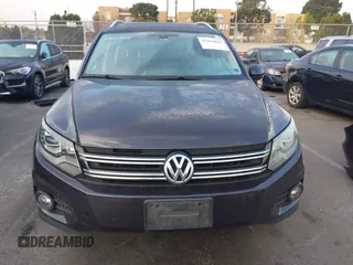 2016 Volkswagen Tiguan S with VIN WVGBV7AX5GW568438, listed as a IAAI auction lot 41434616 with 91,341 mi miles and . Bid and sale history available at DreamBid. Image 13.