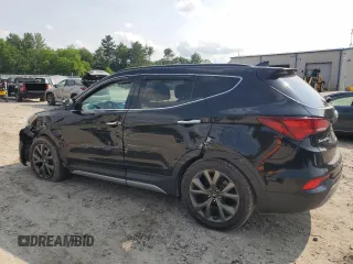 2017 Hyundai Santa Fe Ultimate with VIN 5XYZWDLA2HG487757, listed as a Copart auction lot 60721855 with 54,644 mi miles and Salvage title. Bid and sale history available at DreamBid. Image 2.