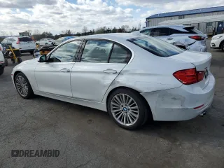 2015 BMW 3 Series 328i xDrive with VIN WBA3B5G54FNS11989, listed as a Copart auction lot 52485505 with 134,230 mi miles and Salvage Title. Bid and sale history available at carsss.com. Image 2.