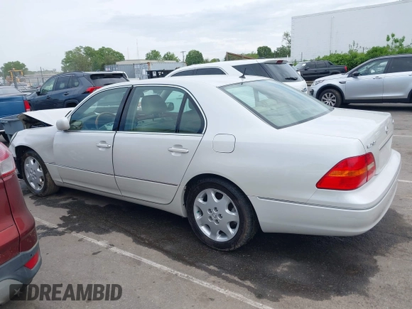2001 Lexus LS 430 with VIN JTHBN30F110026221, listed as a IAAI auction lot 42022976 with 142,418 mi miles. Bid and sale history available at carsss.com. Image 14.