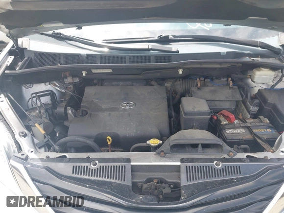 2013 Toyota Sienna LE with VIN 5TDJK3DC9DS054310, listed as a IAAI auction lot 42668103 with 209,712 mi miles and . Bid and sale history available at DreamBid. Image 10.