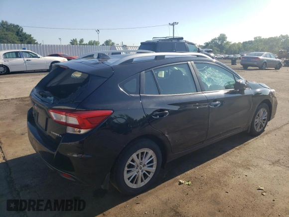 2018 Subaru Impreza Premium with VIN 4S3GTAB68J3739274, listed as a Copart auction lot 62193185 with 58,518 mi miles and Salvage title. Bid and sale history available at DreamBid. Image 3.