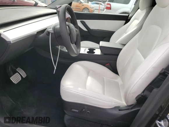 2022 Tesla Model Y Performance with VIN 7SAYGDEF1NF407985, listed as a Copart auction lot 53831325 with 41,225 mi miles and Salvage title. Bid and sale history available at DreamBid. Image 7.