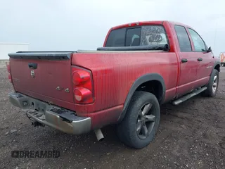 2007 Dodge 1500 SLT with VIN 1D7HU18217S189166, listed as a IAAI auction lot 42168002 with 264,304 mi miles. Bid and sale history available at carsss.com. Image 4.