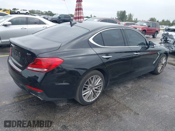 2021 Genesis G70 2.0T with VIN KMTG64LA8MU067129, listed as a IAAI auction lot 41364886 with 48,043 mi miles and . Bid and sale history available at DreamBid. Image 4.