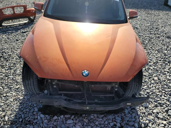 2014 BMW X1 sDrive28i with VIN WBAVM1C59EVW46832, listed as a Copart auction lot 49389605 with 112,257 mi miles and Salvage Title. Bid and sale history available at carsss.com. Image 12.