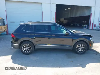 2020 Volkswagen Tiguan SE z VIN 3VV3B7AX7LM035567, wystawiony jako IAAI lot #42316223 z przebiegiem 64 730 mil mil oraz . Historia ofert i sprzedaży dostępna na DreamBid. Obrazek 13.