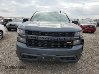 2021 Chevrolet Silverado 1500 Custom with VIN 1GCRWBEK1MZ228490, listed as a Copart auction lot 43900585 with 127,270 mi miles and Salvage Title. Bid and sale history available at DreamBid. Image 5.