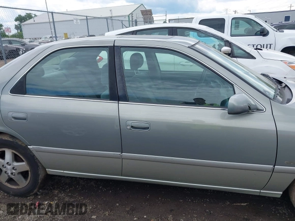 2001 Toyota Camry CE z VIN JT2BG22K410587070, wystawiony jako IAAI lot #42388043 z przebiegiem 119 183 mil mil oraz . Historia ofert i sprzedaży dostępna na DreamBid. Obrazek 14.