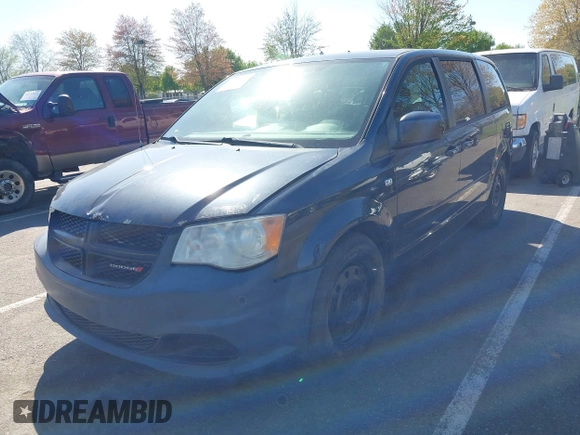 2014 Dodge Grand Caravan SE with VIN 2C4RDGBGXER254634, listed as a IAAI auction lot 42149494 with 158,614 mi miles and . Bid and sale history available at DreamBid. Image 2.