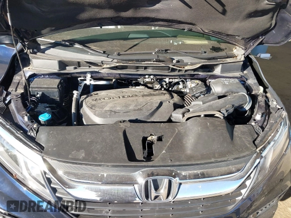 2019 Honda Odyssey LX with VIN 5FNRL6H2XKB124126, listed as a IAAI auction lot 40859906 with 24,369 mi miles and . Bid and sale history available at DreamBid. Image 10.