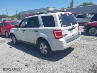 2010 Ford Escape XLT with VIN 1FMCU0D74AKC67975, listed as a IAAI auction lot 41996023 with 199,626 mi miles. Bid and sale history available at carsss.com. Image 3.