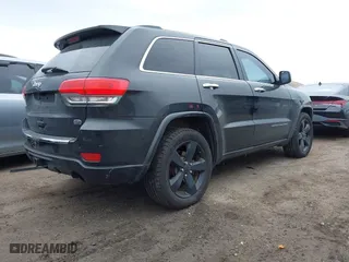 2014 Jeep Grand Cherokee Overland with VIN 1C4RJFCG6EC121654, listed as a IAAI auction lot 42051730 with 163,853 mi miles. Bid and sale history available at carsss.com. Image 4.