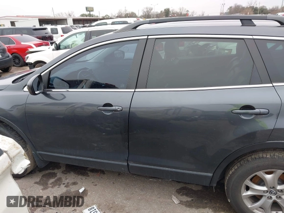 2014 Mazda CX-9 Touring with VIN JM3TB2CA1E0427984, listed as a IAAI auction lot 41620770 with 88,305 mi miles and . Bid and sale history available at DreamBid. Image 15.