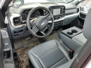2021 Ford F-150 XL with VIN 1FTMF1EP7MKE72931, listed as a Copart auction lot 60650605 with 23,825 mi miles and Salvage title. Bid and sale history available at DreamBid. Image 8.