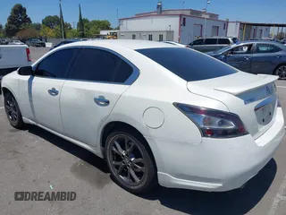 2014 Nissan Maxima SV with VIN 1N4AA5AP4EC907890, listed as a IAAI auction lot 42710257 with 125,659 mi miles and . Bid and sale history available at DreamBid. Image 3.
