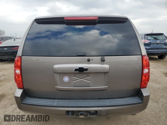 2012 Chevrolet Tahoe Commercial with VIN 1GNSK2E07CR324903, listed as a Copart auction lot 80266624 with 131,700 mi miles and Salvage title. Bid and sale history available at DreamBid. Image 6.