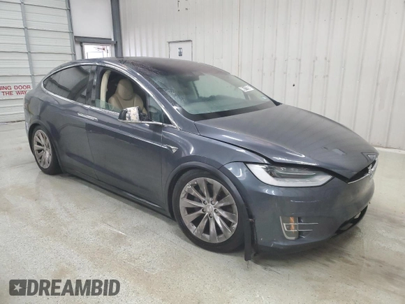 2017 Tesla Model X 90D with VIN 5YJXCDE29HF035544, listed as a Copart auction lot 45111265 with Not Provided miles and Clean Title. Bid and sale history available at DreamBid. Image 4.