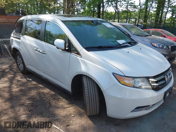 2014 Honda Odyssey EX-L with VIN 5FNRL5H63EB064854, listed as a IAAI auction lot 42102704 with 148,536 mi miles and . Bid and sale history available at carsss.com. Image 1.